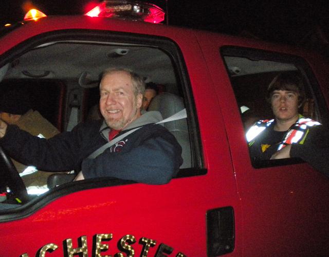 Elwin and Ben following Santa in Utility 4, Santa detail 2011